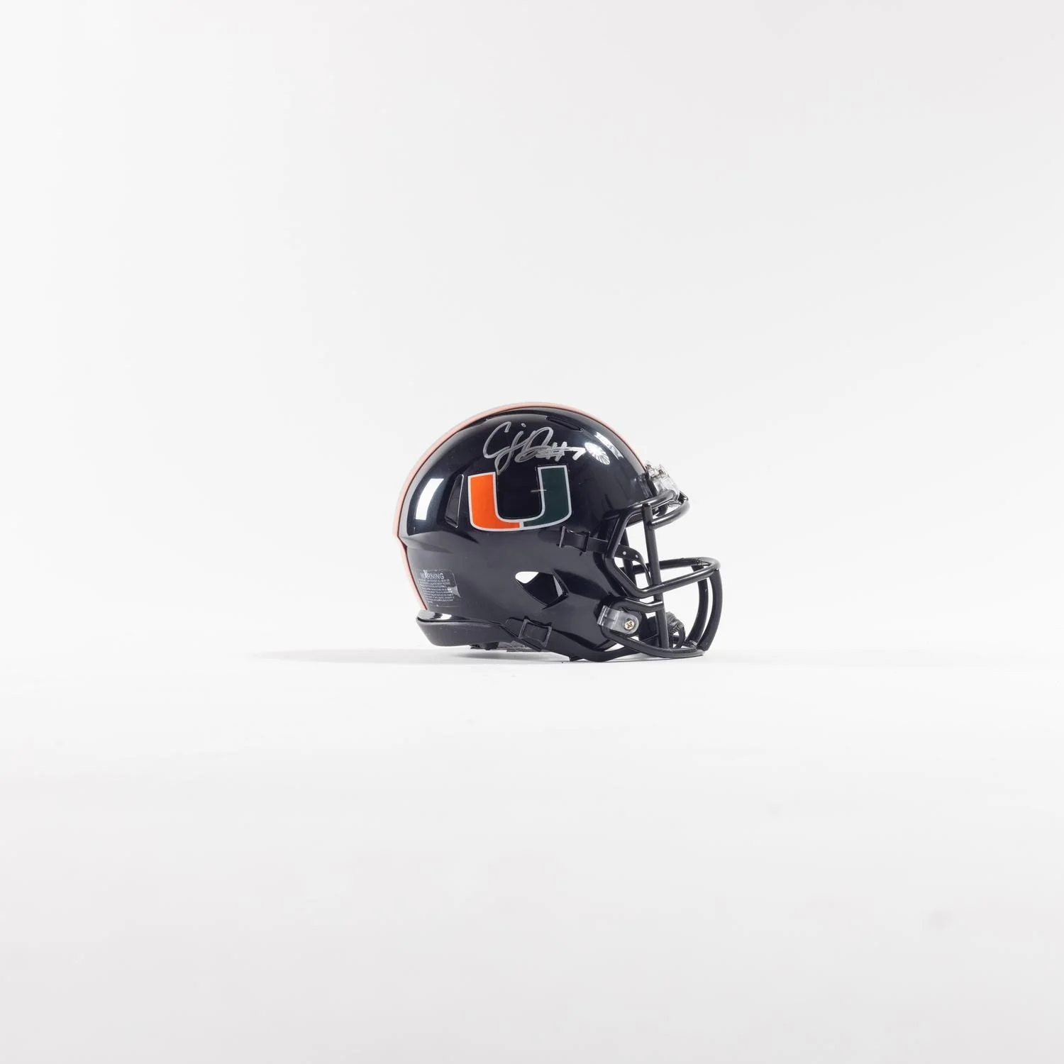 Riddell Miami Hurricanes Student Athlete #7 CJ Daniels Autographed Black Mini Football Helmet